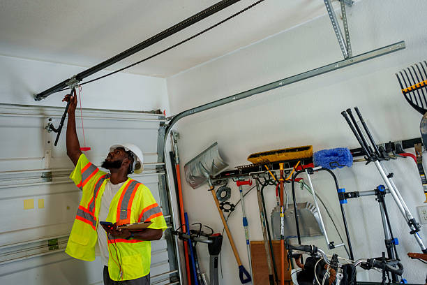 Professional Garage Door Panel Replacement technician working in Dexter, GA